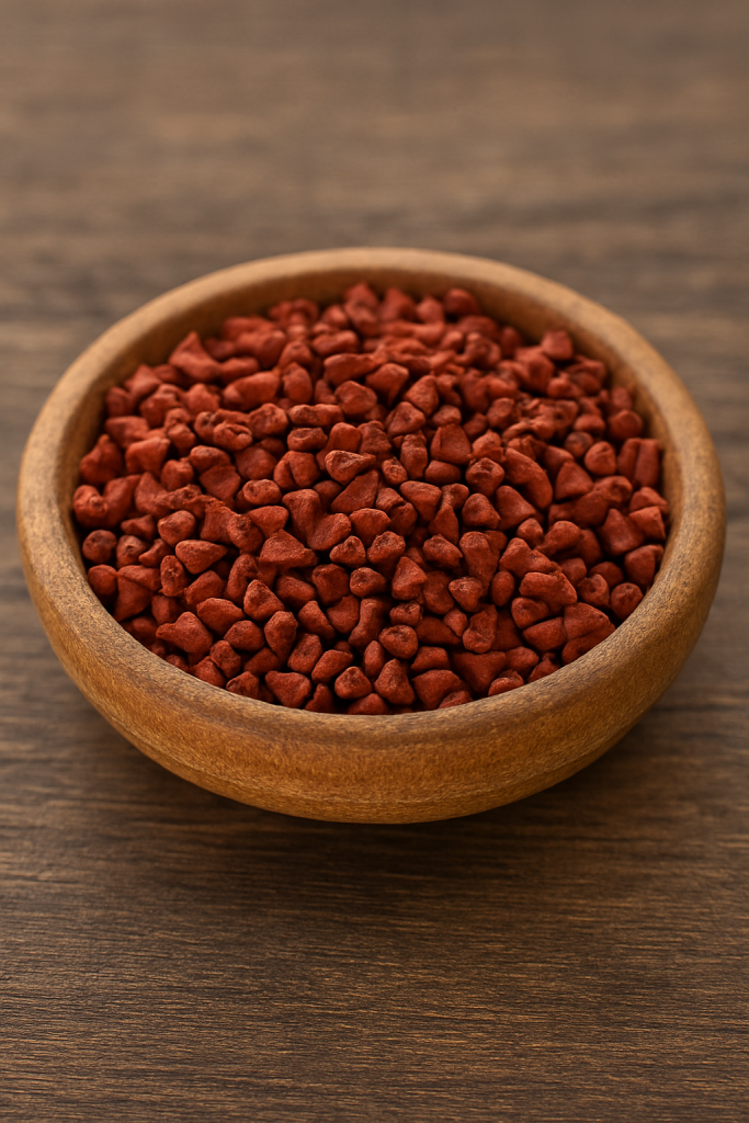 Bright red Jamaican Annatto seeds used traditionally for skin care, inflammation, and blood support