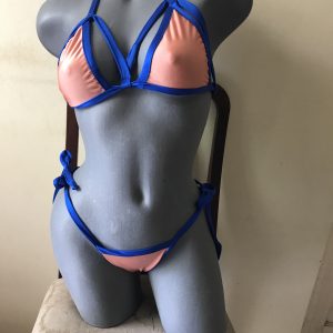 Peach bikini with blue trim and open strap detailing