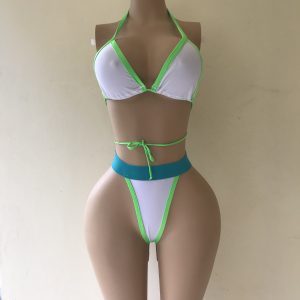 Lightning bikini in white with neon green trim and turquoise waistband – front view on mannequin