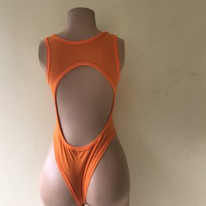 Temptress Temptress one-piece swimsuit in bright orange with open back and high-cut design – back view on mannequin